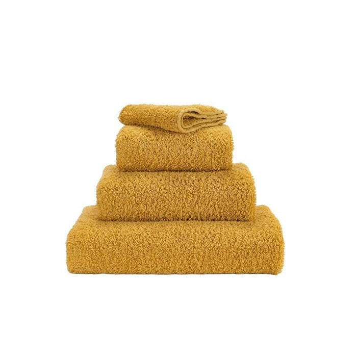 Abyss Super Pile Euro Hand Towel 23X43 Safran 850 - View 1 at Fig Linens and Home