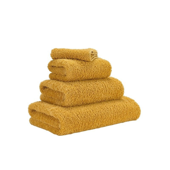 Abyss Super Pile Euro Hand Towel 23X43 Safran 850 - View 2 at Fig Linens and Home
