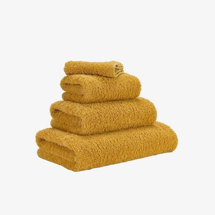 Abyss Super Pile Wash Cloth 12x12 Safran 850 - View 2 at Fig Linens and Home