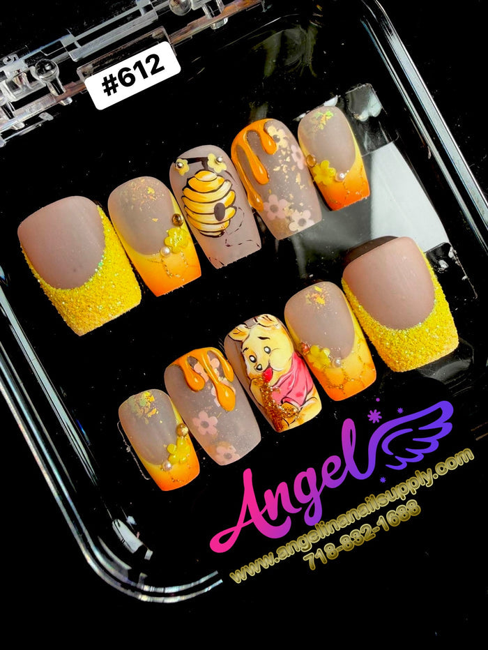 Nail art display with colorful designs and 'Angel' branding.