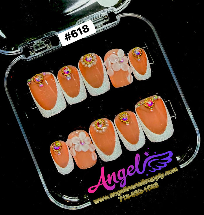 Set of decorative false nails in a clear case with 'Angel Nails Supply' branding.