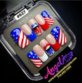 Nail art display with American flag design in a Nailbox container.
