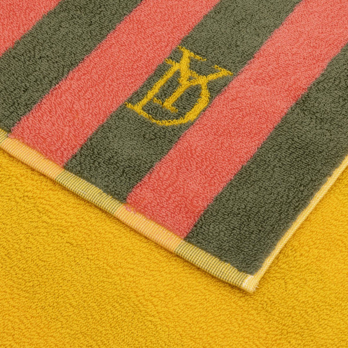 Corail Jacquard Beach Towel by Yves Delorme at Fig Linens and Home in Color Goyave - View 3