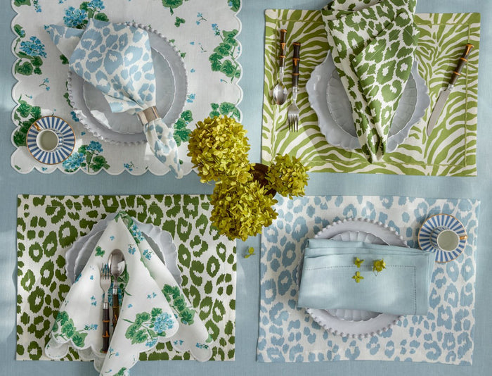 Geranium Oblong Placemats in Blue by Matouk x Tillett shown on upper left of Image