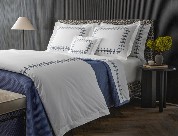 Gordian Knot Percale Bedding by Matouk at Fig Linens and Home shown on Luxury Bed