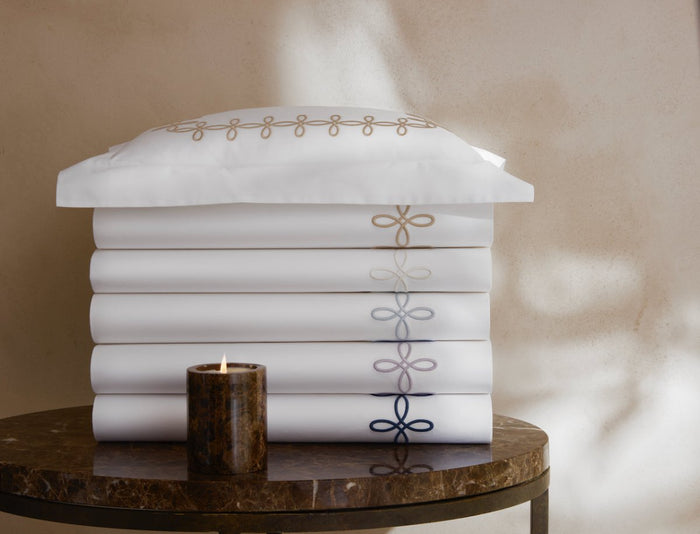 Gordian Knot Percale Bedding by Matouk at Fig Linens and Home - Stack of Colors