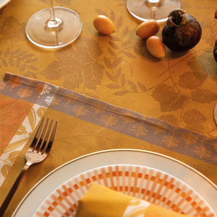 Manor Lane Enduit Orange Coated Placemat by Le Jacquard Français
