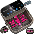 Pink massage tools in a brown electronic device with digital display and remote control.