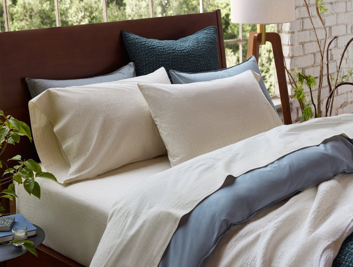 Organic Crinkled Percale Undyed w/ Indigo Gray Sheet Set Styled Room View | Coyuchi at Fig Linens and Home