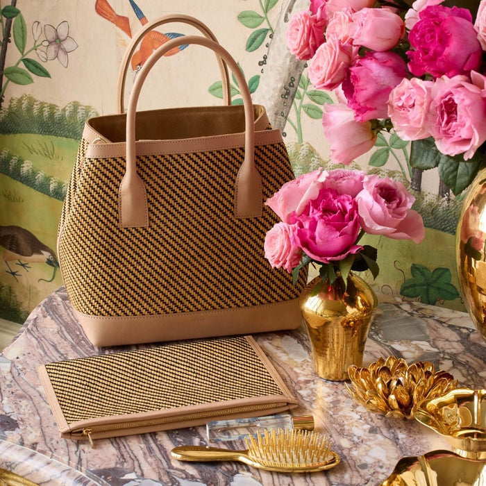 Raffia Pouch Natural/Black by AERIN shown in Lifestyle with Tote and Flowers