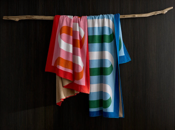 Ribbon Beach Towels by Matouk at Fig Linens and Home - Hanging View at Fig Linens and Home