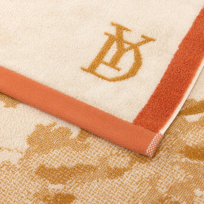 Rive Jacquard Beach Towel by Yves Delorme at Fig Linens and Home - Lifestyle - Color Sable 3