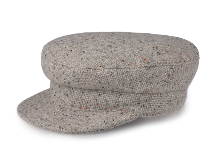 The Skipper Cap Tweed by Hanna Hats is a light grey Irish newsboy cap with a flat top, short stiff brim, and subtle dark speckles in the fabric, shown on a white background.