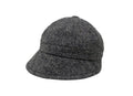 The Hanna Hats Slieve League Hat Tweed is a gray woolen cloche with a short brim and rounded crown, inspired by the Donegal Coast’s dramatic cliffs. Shown on a white background.