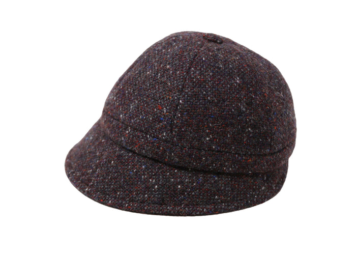 The Hanna Hats Slieve League Hat Tweed features brown tweed, a short brim, and a rounded crown, inspired by Donegal's rugged coastline and shown on a white background.