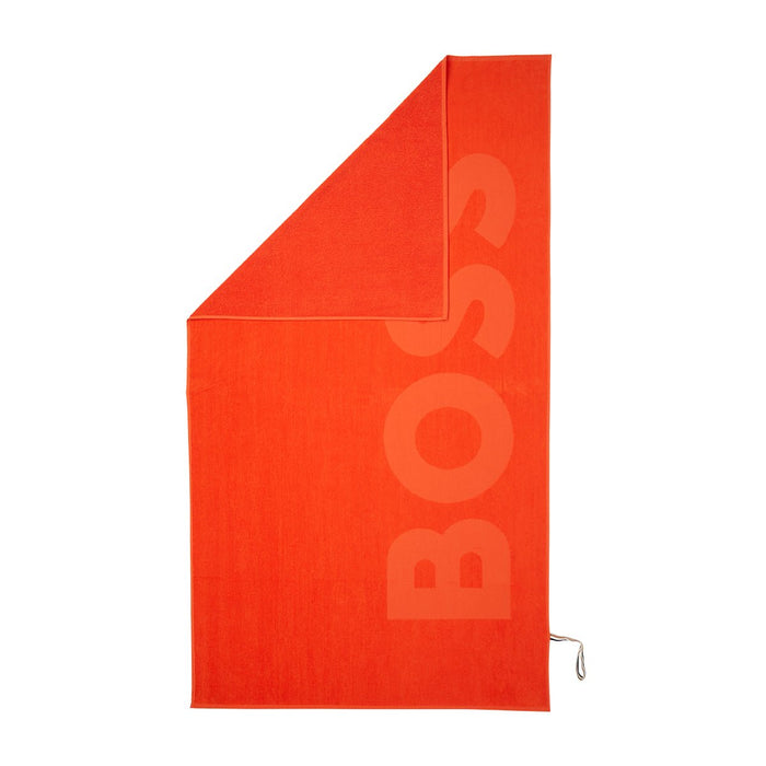 Zuma Sculpted Beach Towel by Hugo Boss Home | Yves Delorme Spice Pool Towel at Fig Linens and Home 1