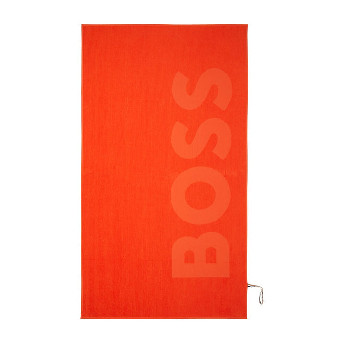 Zuma Sculpted Beach Towel by Hugo Boss Home | Yves Delorme Spice Pool Towel at Fig Linens and Home 3